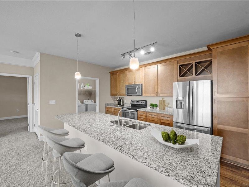 a kitchen with a granite counter top
