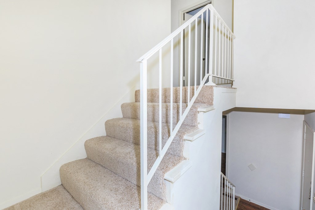 Loft Staircases at Louisburg Square Apartments & Townhomes, Kansas, 66212