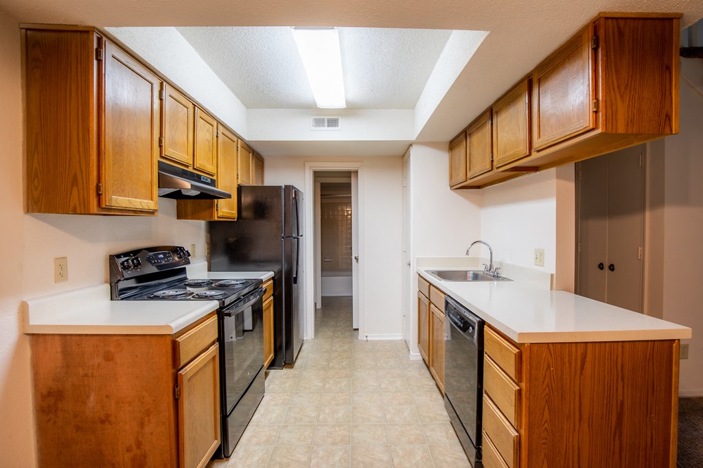 Modern Kitchen With Custom Cabinet at Waterford Place Apartments & Townhomes, Overland Park, Kansas