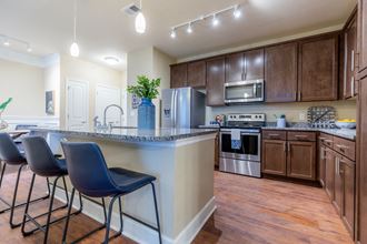 Fully Equipped Kitchen at The Residences at Bluhawk Apartments, Overland Park - Photo Gallery 3