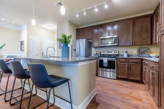Fully Equipped Kitchen Fully Equipped Kitchen at The Residences at Bluhawk Apartments, Overland Park - Photo Gallery
