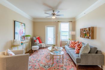 Living Room With Ceiling Fan at The Residences at Bluhawk Apartments, Overland Park, Kansas