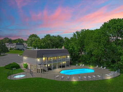 A house with a pool in the backyard.