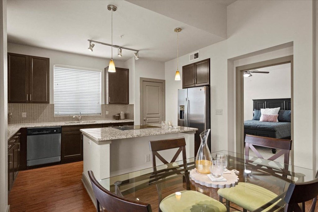 Kitchen And Dining Area at Cypress at Lewisville Apartment Homes, Lewisville Texas