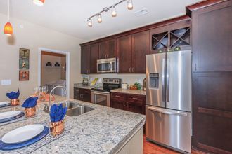 Well Equipped Kitchen at Sorrento at Deer Creek Apartment Homes, Overland Park, KS, 66213