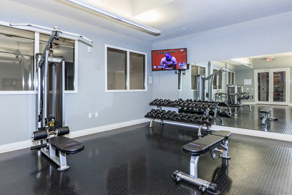 Bench press and weightsat West 39th Street Apartments, Kansas City, 64111