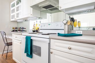 Kitchen space cabinets at Wynnewood Farms Apartments, Overland Park, 66209