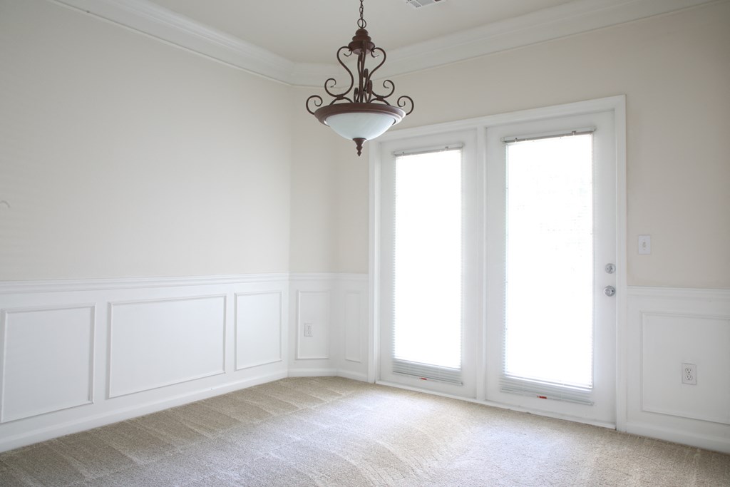 Ceiling fan and lights with window light at Wynnewood Farms Apartments, Overland Park, 66209