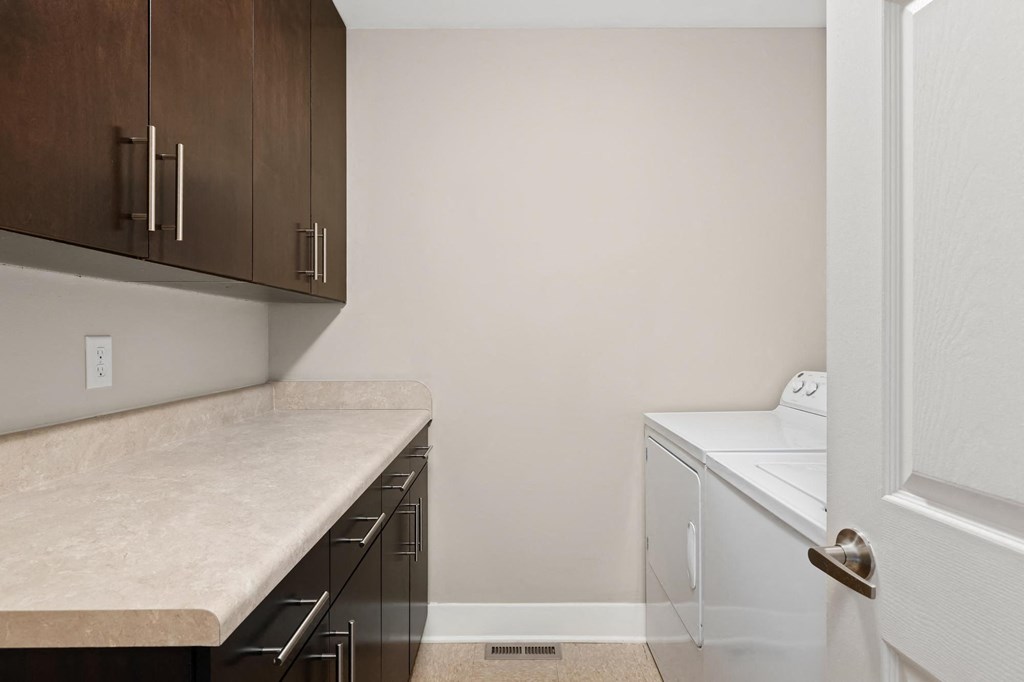 In-Unit Laundry Rooms w/ Storage, and a Washer and Dryer at Cambria Luxury Apartment Homes, Missouri, 64112