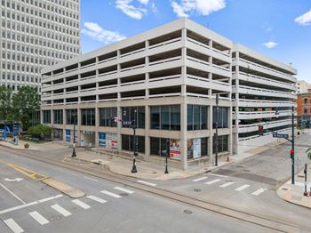 a large building on the corner of a city street
