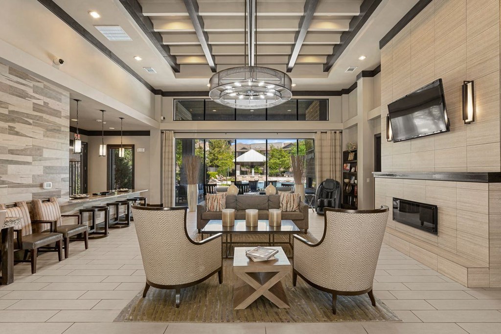 Community living room at Ovation at Lewisville Apartment Homes, Lewisville, TX, 75067