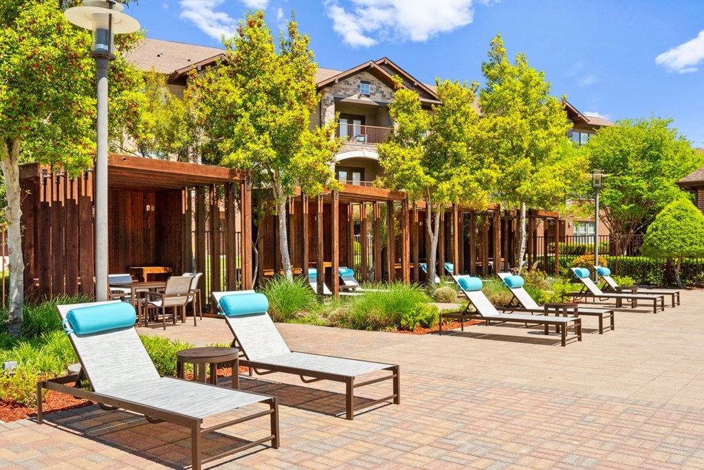 Poolside Lounge Chairs at Cypress at Lewisville Apartment Homes, Lewisville, 75067