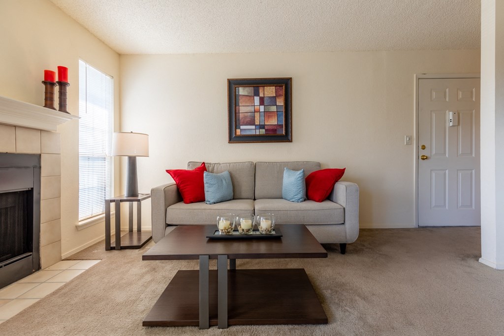 Couch in living room and center tableat Coventry Oaks Apartments, Overland Park, Kansas