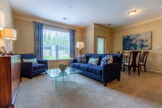 Living Room With Dining Area at Avignon Apartment Homes, Olathe, Kansas
