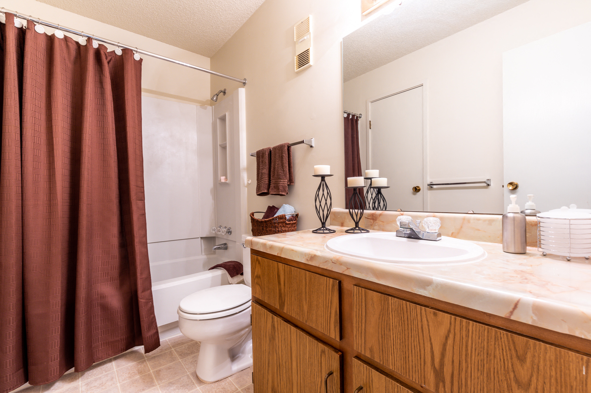 Bathroom sink, toilet and shower at Bristol Pointe Apartments, Olathe, Kansas