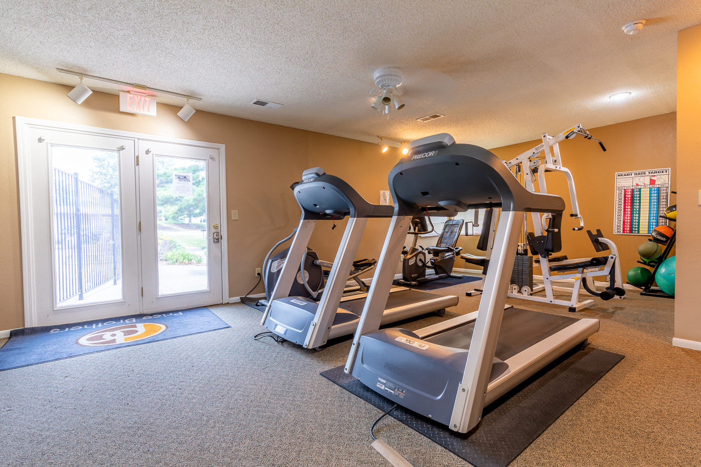 fitness center with treadmills at Bristol Pointe Apartments, Olathe, Kansas