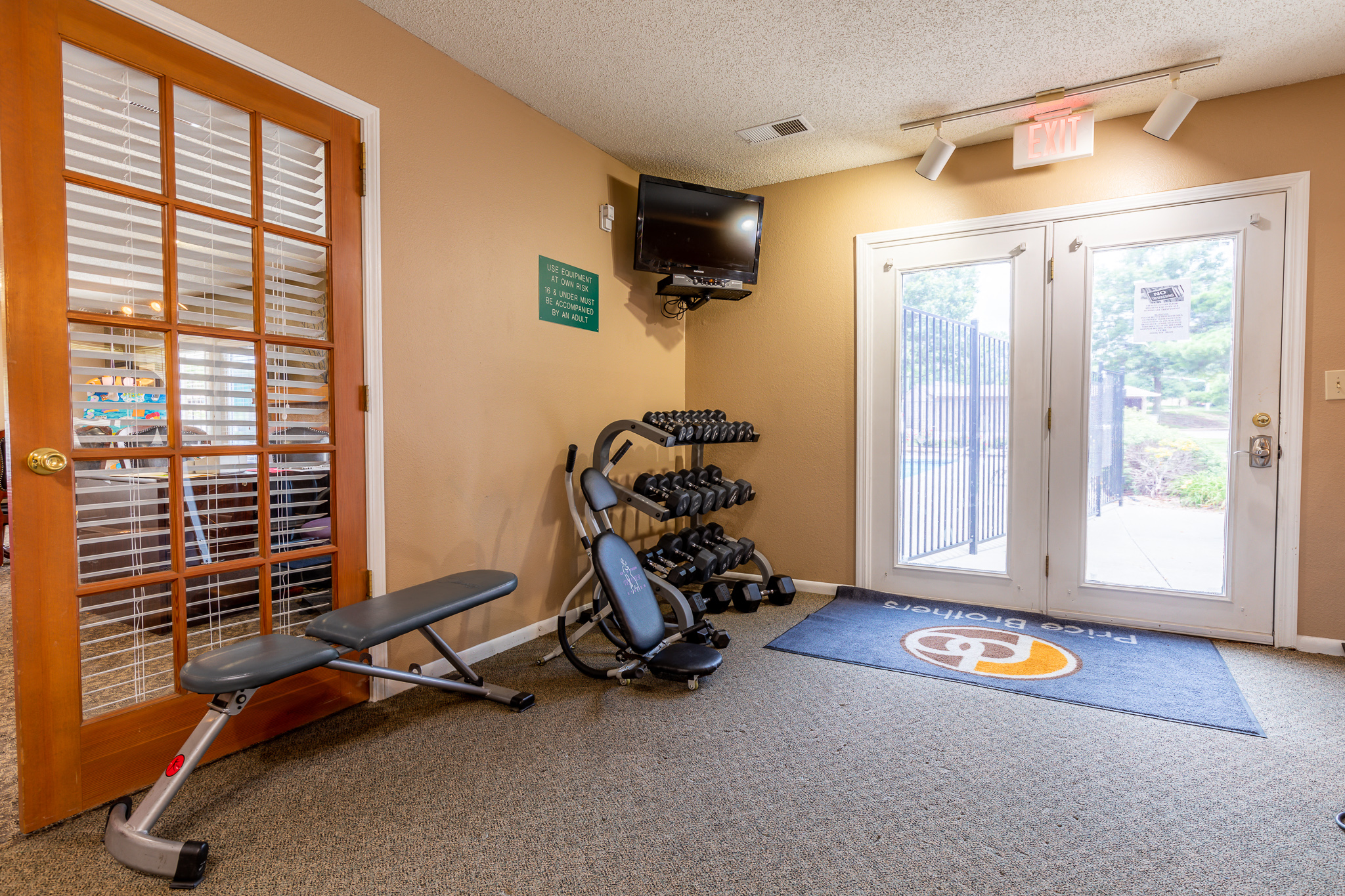 fitness center with free weights  at Bristol Pointe Apartments, Olathe, Kansas