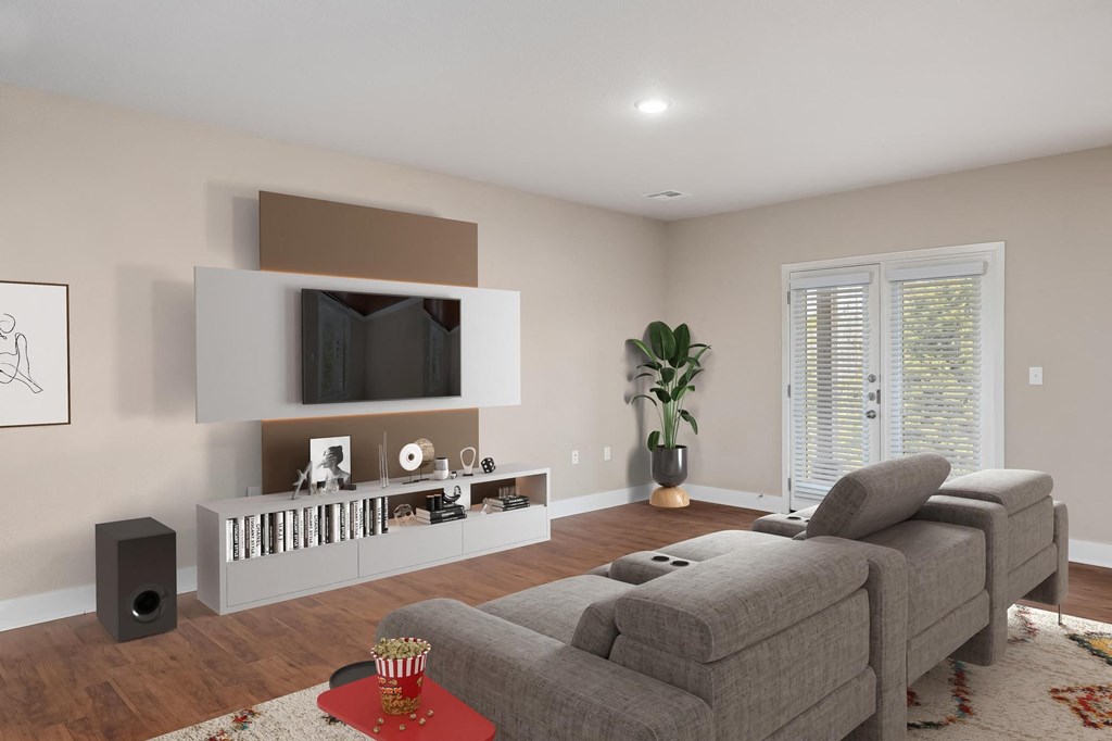 a living room with a couch and a tv