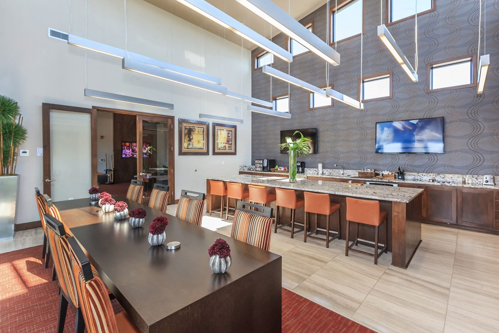 clubhouse kitchen and tables  at Prairie Creek Apartments & Townhomes, Lenexa, 66219