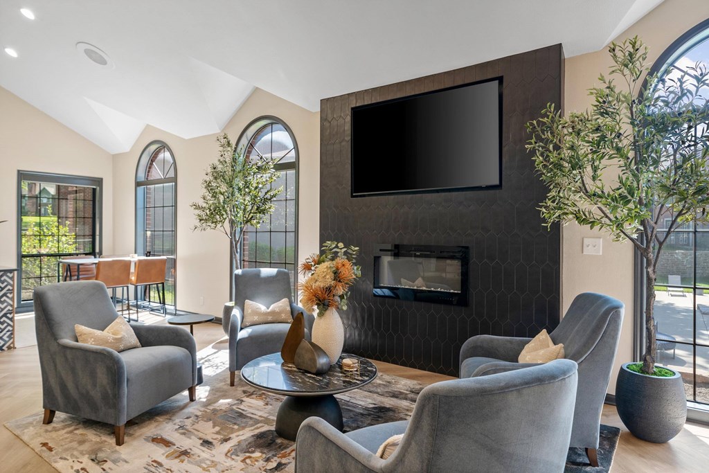 Clubroom With TV And Fireplace at Highland Park Apartment Homes, Overland Park