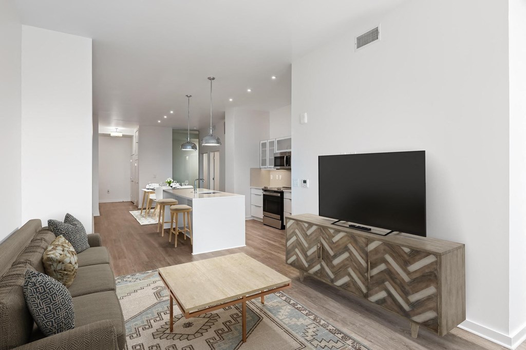 Living with couch at Sky On Main Apartments, Missouri City