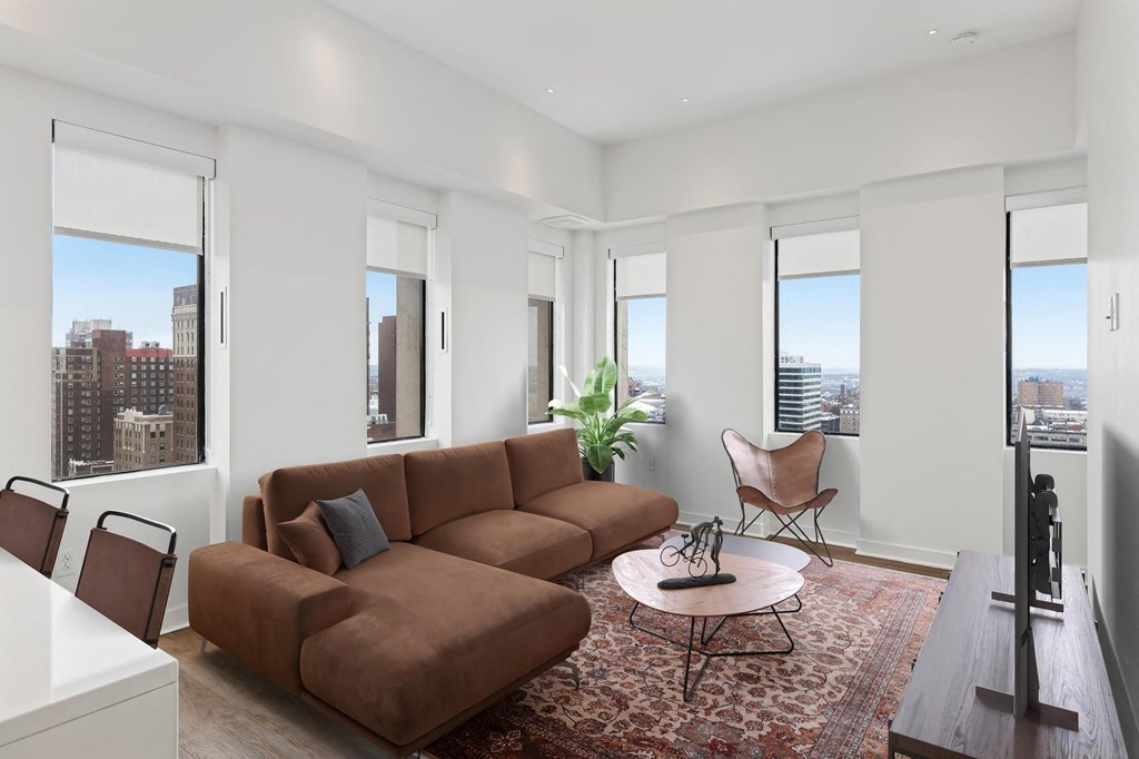 One bedroom Living Room at Sky On Main Apartments, Missouri City, MO