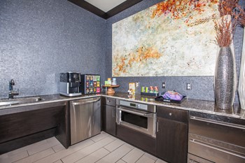 clubhouse cafe with coffee bar and kitchen