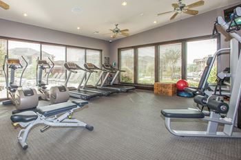 modern fitness center at Ovation at Lewisville Apartments, Lewisville, TX
