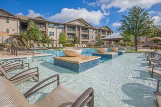 pool with sun deck at Ovation at Lewisville Apartments, Lewisville, 75067 - Photo Gallery 4