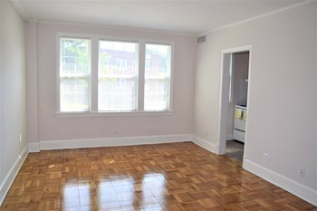 Expansive Living Areas- Many With Wood Flooring Image of Living Space With Wood Flooring at Colonial Village West | Affordable Arlington Apartments - Photo Gallery 4