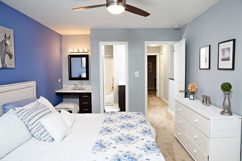 Large bedroom with vanity area