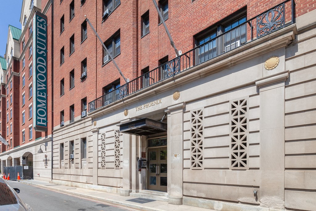 a large brick building with a sign on the front of it