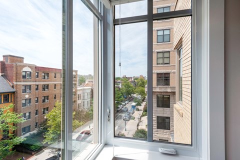 the view from the living room window of the apartment