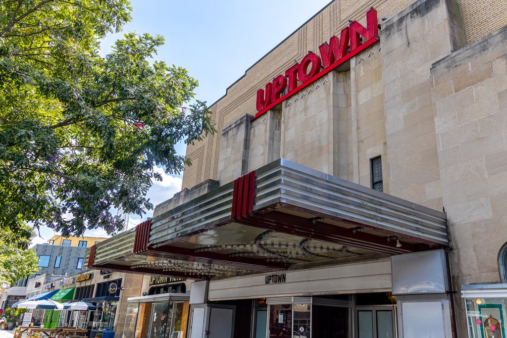a building with a red sign on top of it