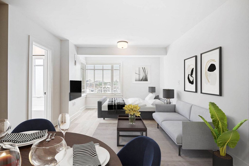 a living room with a couch and a table