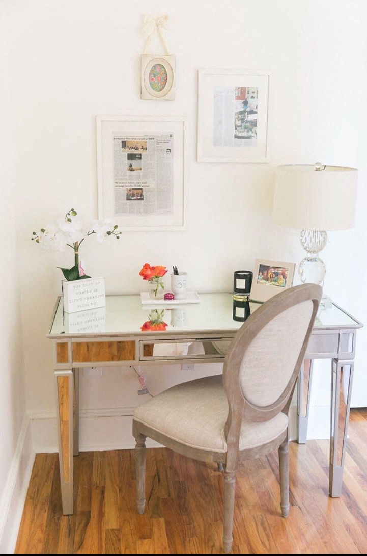 a home office with a desk and a chair