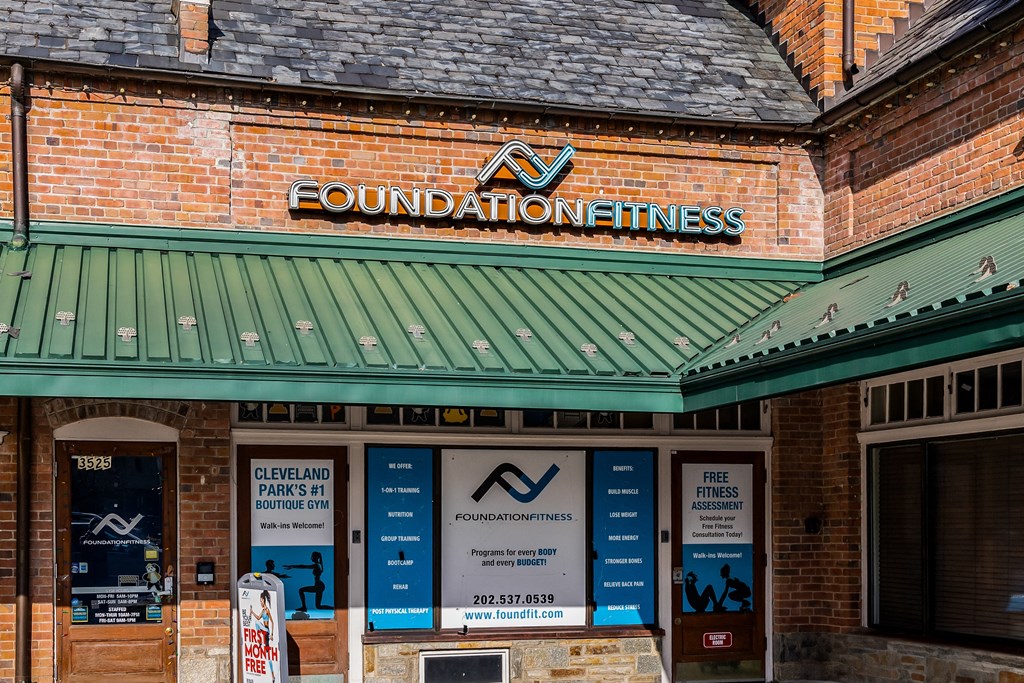 the front of a building with a sign that reads foundation fitness