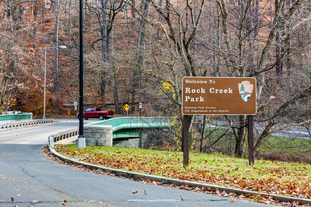 a sign park on the side of a road