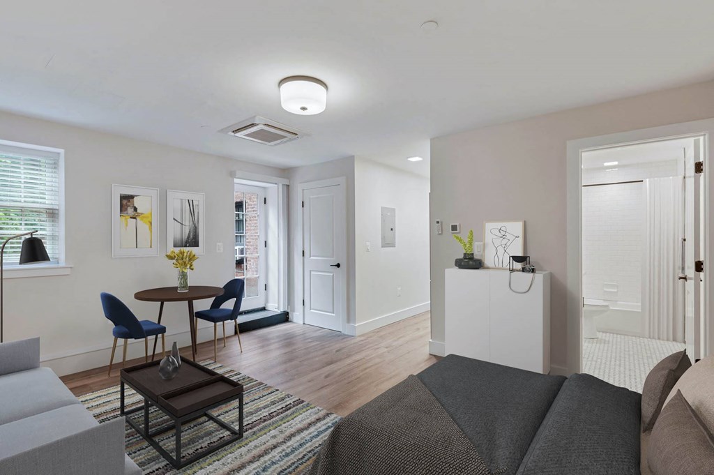 a living room with a couch and a table