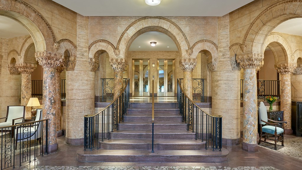 lobby of the estate has columns and arches