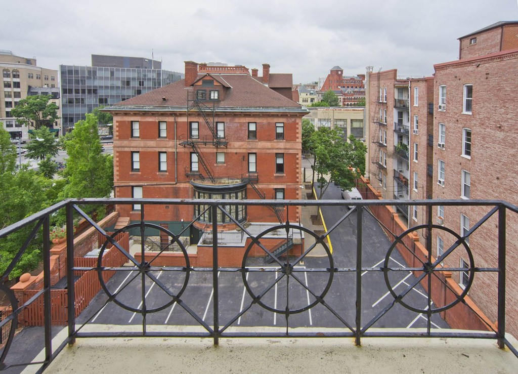a bicycle on a bridge over a city street