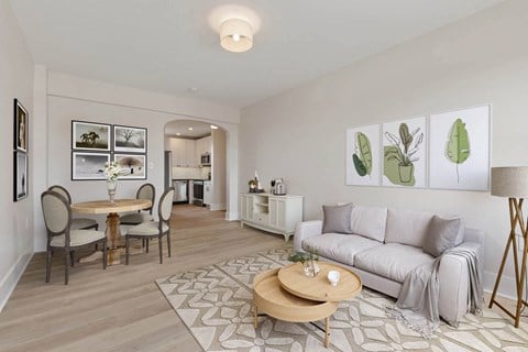 a living room with a couch and a table