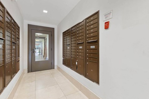 the lockers in the hallway of a building with a door