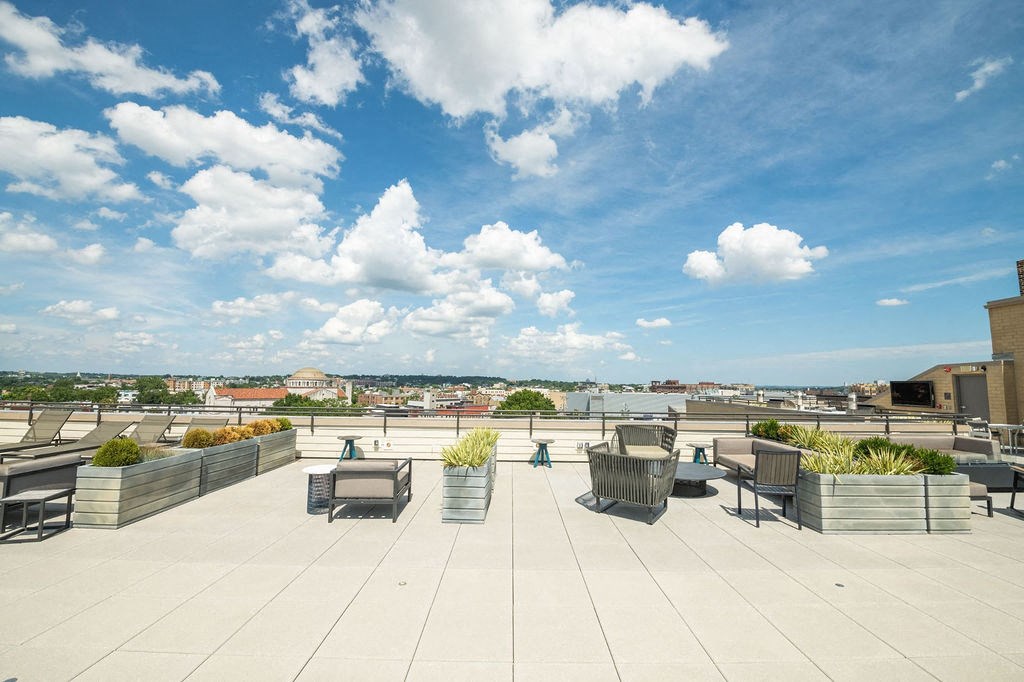 the terrace of the building has views of the city and the water