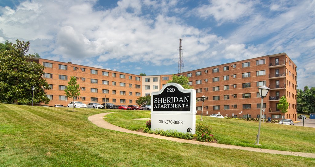 a large building with a sign in front of it