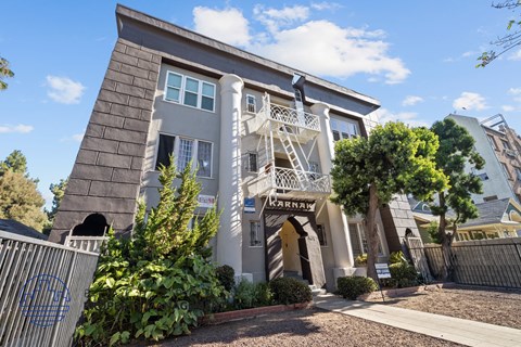 the exterior of a building with a staircase on the side