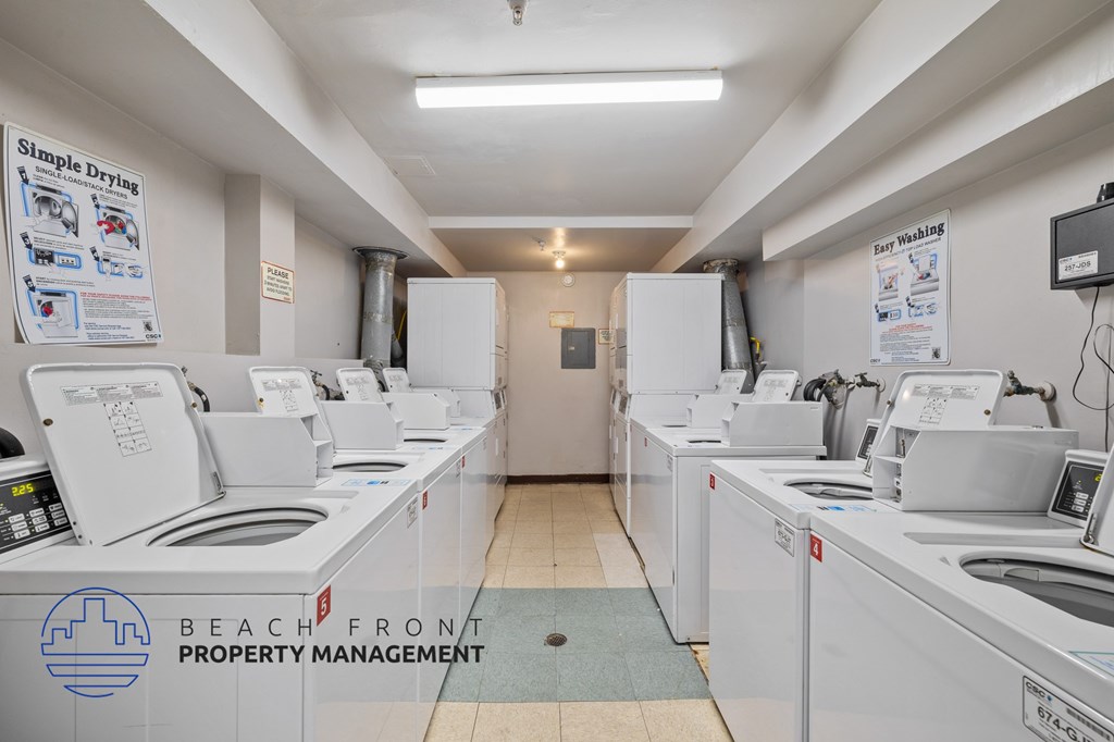 A laundromat with the words "Simple Dry" on the wall.
