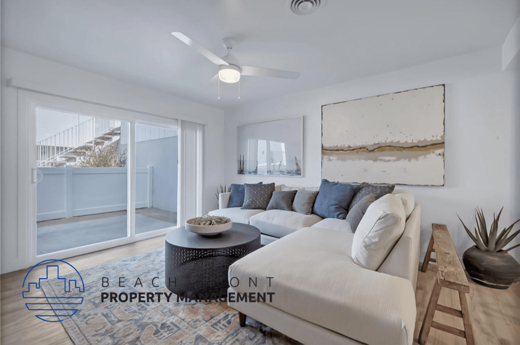 a white living room with a couch and a table