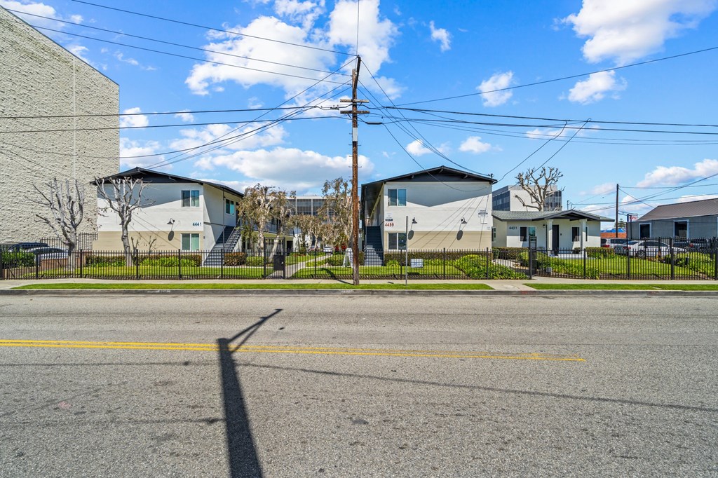 a row of houses on the side of a street