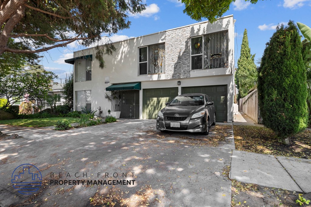 a car parked in front of a house